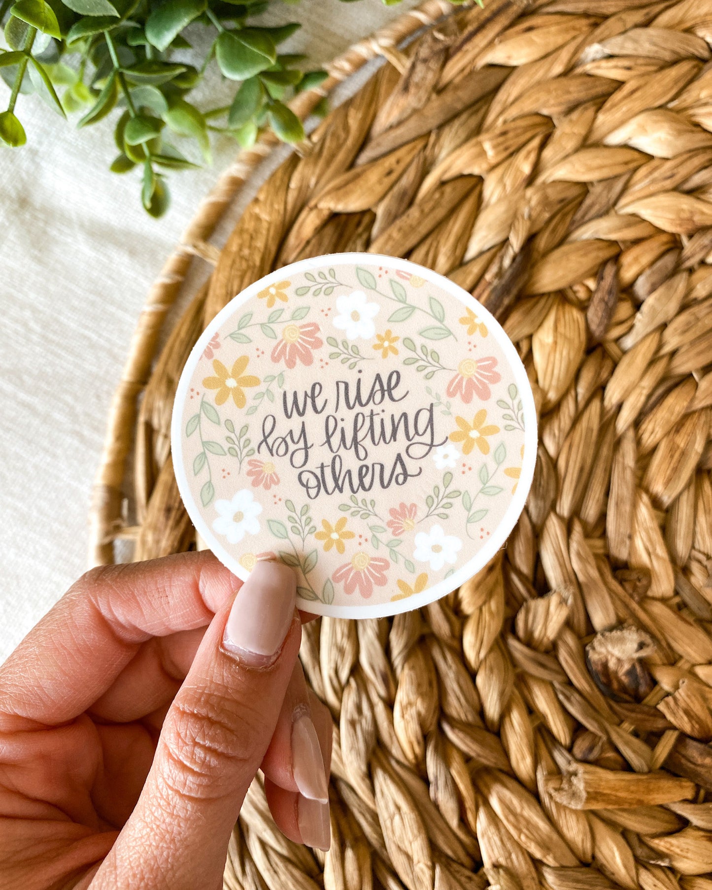 We Rise By Lifting Others Sticker